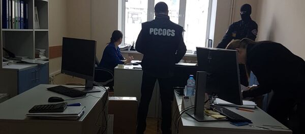 Percheziții și rețineri pe un dosar de evaziune fiscală și escrocherie - Sputnik Moldova