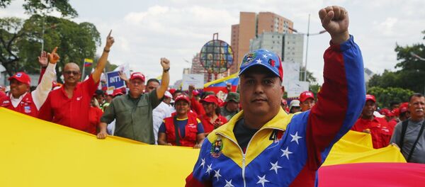 Акция в поддержку Н. Мадуро в Венесуэле - Sputnik Moldova-România
