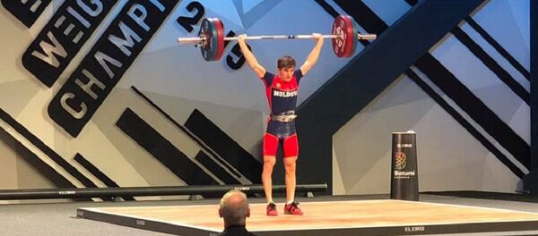 Молдавский тяжелоатлет Даниел Лунгу - Sputnik Молдова