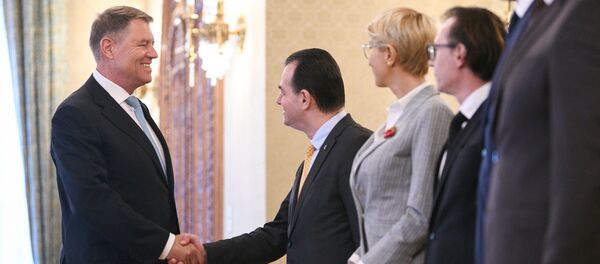 Klaus Iohannis şi Ludovic Orban - Sputnik Moldova-România