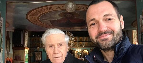 Foto: Dan Chitic, alături de duhovnicul său, părintele Ilie Georgescu Foto: Dan Chitic, alături de duhovnicul său, părintele Ilie Georgescu - Sputnik Moldova-România