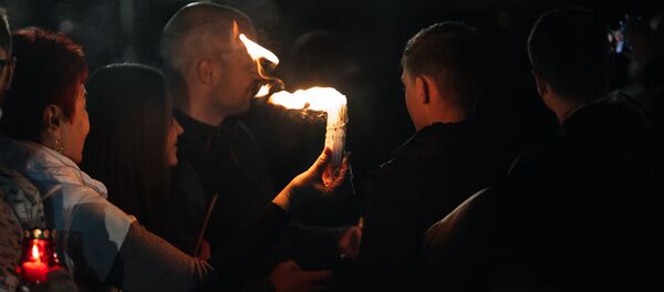 Благодатный огонь в Кишиневе Благодатный огонь в Кишиневе - Sputnik Молдова
