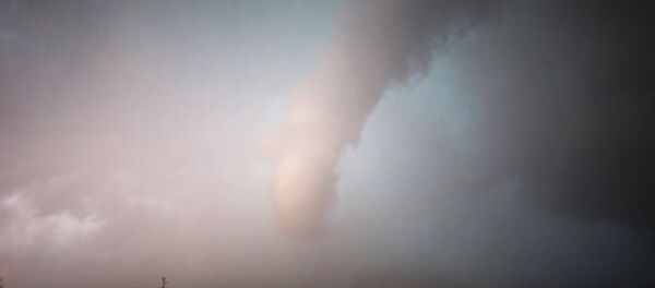 A Tornado is seen in Keystone Lake, Oklahoma, March 25, 2015 - Sputnik Moldova