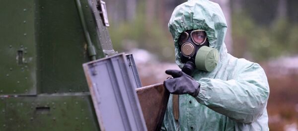 Учения взвода радиационной, химической и биологической защиты Учения взвода радиационной, химической и биологической защиты - Sputnik Молдова