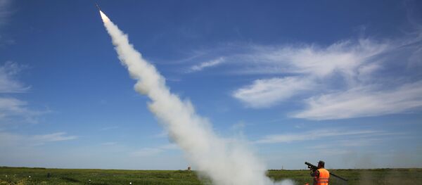 Военнослужащие во время стрельб из переносного зенитного ракетного комплекса Игла на всеармейском конкурсе Чистое небо на полигоне Ейский Учебного центра войсковой противовоздушной обороны Военнослужащие во время стрельб из переносного зенитного ракетного комплекса Игла на всеармейском конкурсе Чистое небо на полигоне Ейский Учебного центра войсковой противовоздушной обороны - Sputnik Молдова