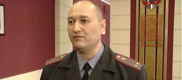 Заместитель начальника отдела Национального центрального бюро Интерпола в Беларуси Дмитрий Медведев Заместитель начальника отдела Национального центрального бюро Интерпола в Беларуси Дмитрий Медведев - Sputnik Молдова