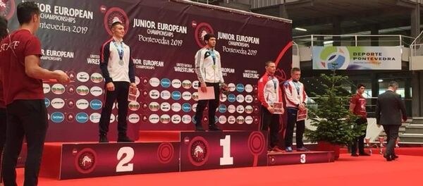 Пьедестал почета на молодежном чемпионате Европы по борьбе Пьедестал почета на молодежном чемпионате Европы по борьбе - Sputnik Молдова