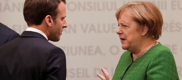 Angela Merkel and Emmanuel Macron Angela Merkel and Emmanuel Macron - Sputnik Moldova-România