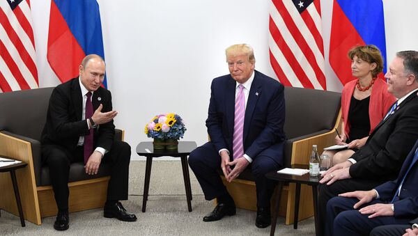 Президент РФ Владимир Путин и президент США Дональд Трамп во время встречи на полях саммита Группы двадцати в Осаке - Sputnik Moldova-România