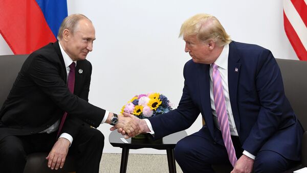 Vladimir Putin și Donald Trump, la întrevederea organizată în marja summitului G20, Osaka - Sputnik Moldova
