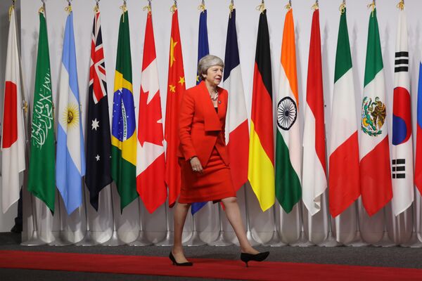 Prim-ministrul Marii Britaniei, Theresa May, la summitul G20 la Osaka. - Sputnik Moldova