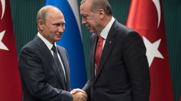 Russian President Vladimir Putin and Turkish President Recep Tayyip Erdogan, right, at a news conference following the Russian-Turkish talks in Ankara - Sputnik Moldova