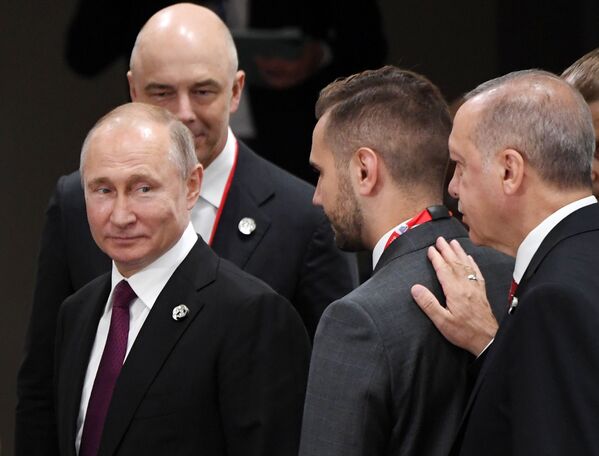 Preşedintele FR, Vladimir Putin, şi preşedintele Turciei, Recep Tayyip Erdogan, în marja summit-ului G20 d ela Osaka - Sputnik Moldova-România