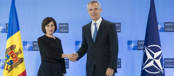 Молдавский премьер Майя Санду и генсек НАТО Йенс Столтенберг - Sputnik Moldova
