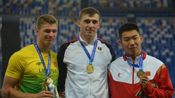 Молдавский спортсмен Андриан Мардаре завоевал золотую медаль в метании копья на Всемирной летней универсиаде-2019 - Sputnik Молдова