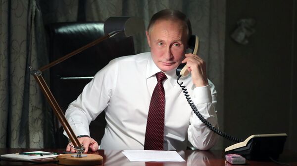 Președintele V. Putin vorbește la telefon - Sputnik Moldova