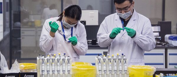 Сотрудники лаборатории в Нанкине, архивное фото Сотрудники лаборатории в Нанкине, архивное фото - Sputnik Молдова