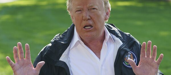 President Donald Trump talks to media before boarding Marine One on the South Lawn of the White House in Washington, Wednesday, Sept. 19, 2018, for the short trip to Andrews Air Force Base en route to Havelock, N.C. - Sputnik Moldova