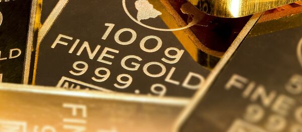 Слитки золота, архивное фото. - Sputnik Молдова