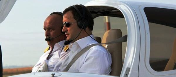 Vlad Filat în avion - Sputnik Moldova