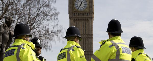 Британские полицейские возле Элизабет-Тауэр (Биг-Бен) у здания парламента в Лондоне - Sputnik Moldova-România