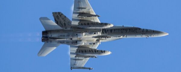 Американский истребитель F-18 во время совместных учений войск НАТО Trident Juncture 2018 (Единый трезубец) в Норвегии - Sputnik Moldova