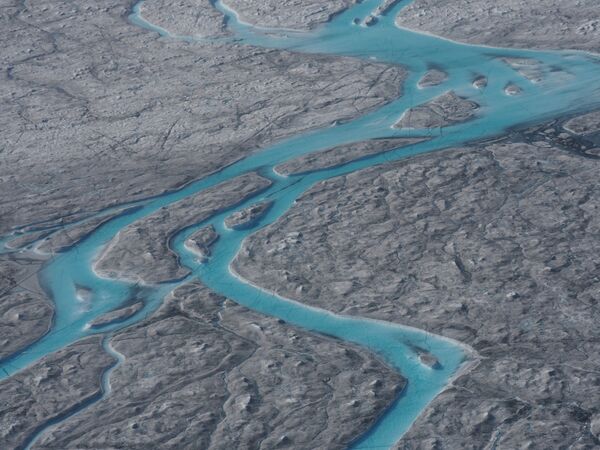 Таяние льда во время сильной жары в Кангерлуссуаке, Гренландия - Sputnik Moldova-România