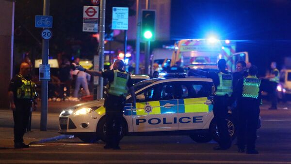 Police attend to an incident near London Bridge in London, Britain, June 3, 2017 - Sputnik Moldova-România