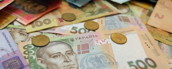 Украинские гривны и копейки Украинские гривны и копейки - Sputnik Молдова