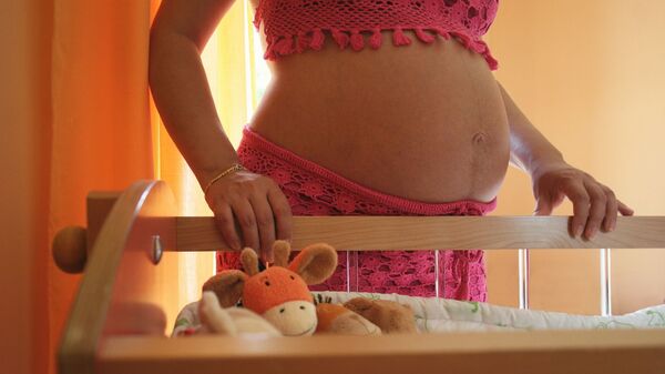 Беременная женщина, архивное фото - Sputnik Moldova