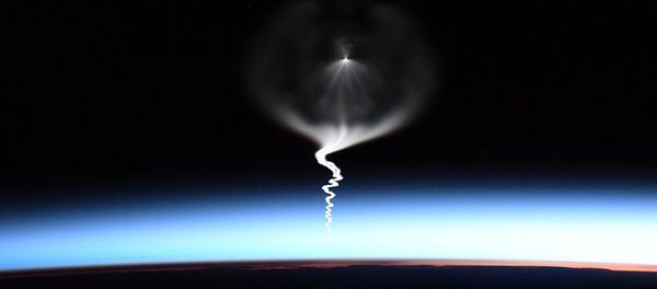 Международная космическая станция в открытом космосе - Sputnik Молдова