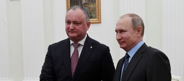 Igor Dodon și Vladimir Putin
 - Sputnik Moldova