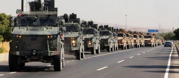 Un convoi militar turc în Kilis, lângă granița turco-siriană Un convoi militar turc în Kilis, lângă granița turco-siriană - Sputnik Молдова
