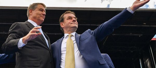   Klaus Iohannis și Ludovic Orban - Sputnik Moldova-România