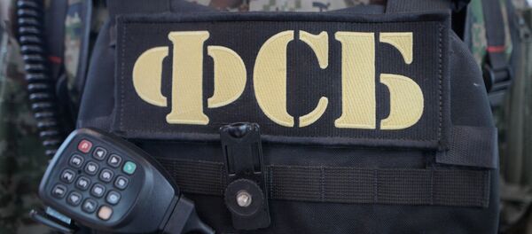 Бронежилет и рация сотрудника ФСБ РФ, архивное фото Бронежилет и рация сотрудника ФСБ РФ, архивное фото - Sputnik Moldova-România