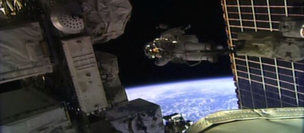 Астронавт Джессика Мейр за пределами МКС Астронавт Джессика Мейр за пределами МКС - Sputnik Молдова