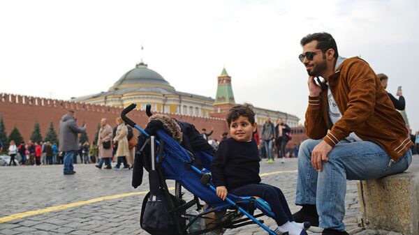 Иностранные туристы на Красной площади в Москве - Sputnik Молдова