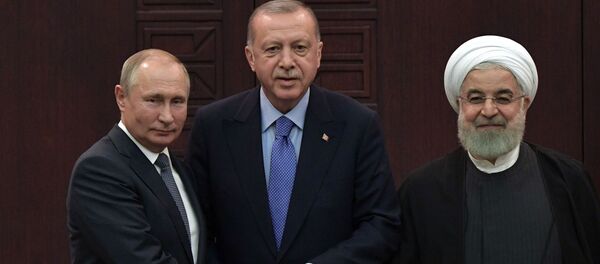 President of Russia Vladimir Putin, Turkish President Recep Tayyip Erdogan and Iranian President Hassan Rouhani during a joint press conference after the 5th Trilateral Summit in Astana format on the Syrian crisis   - Sputnik Moldova-România