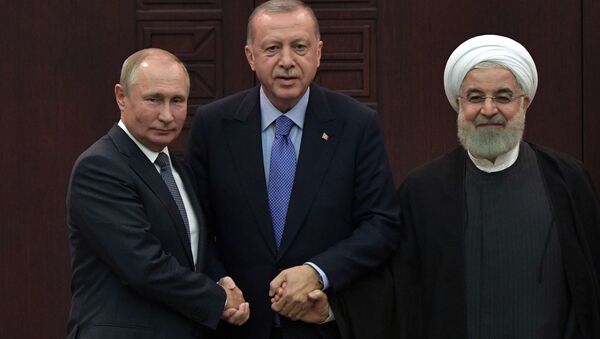 President of Russia Vladimir Putin, Turkish President Recep Tayyip Erdogan and Iranian President Hassan Rouhani during a joint press conference after the 5th Trilateral Summit in Astana format on the Syrian crisis   - Sputnik Moldova-România