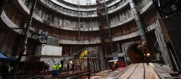 Рабочие на строительной площадке станции метро Ржевская Большой кольцевой линии (БКЛ) в Москве Рабочие на строительной площадке станции метро Ржевская Большой кольцевой линии (БКЛ) в Москве - Sputnik Молдова