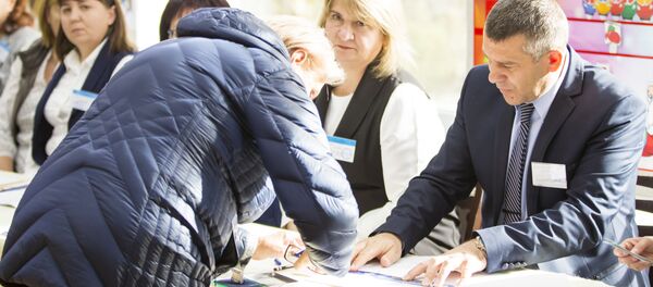 Кишиневцы голосуют на втором туре местных выборов Кишиневцы голосуют на втором туре местных выборов - Sputnik Moldova