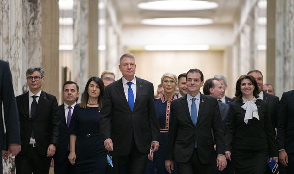 Klaus Iohannis şi Ludovic Orban. Guvernului României  - Sputnik Moldova-România