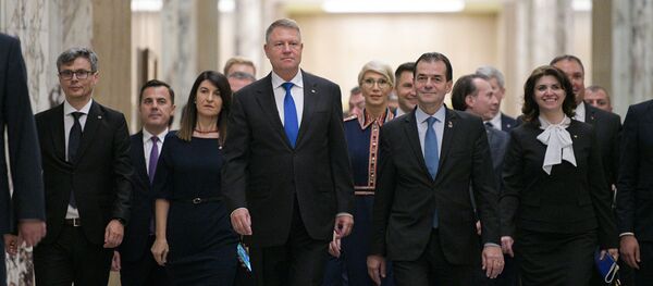 Klaus Iohannis şi Ludovic Orban. Guvernului României Klaus Iohannis şi Ludovic Orban. Guvernului României - Sputnik Moldova-România