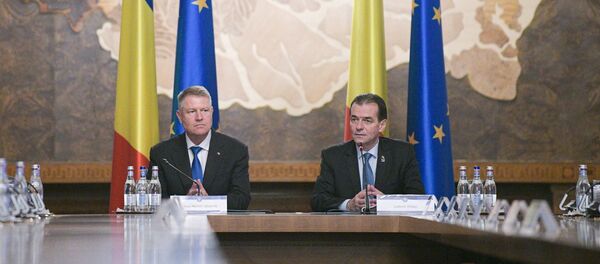 Klaus Iohannis şi Ludovic Orban. Guvernului României  - Sputnik Moldova-România