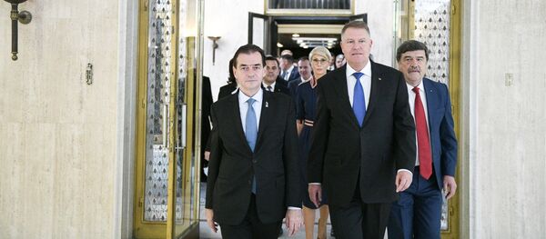Klaus Iohannis şi Ludovic Orban. Guvernului României  - Sputnik Moldova-România