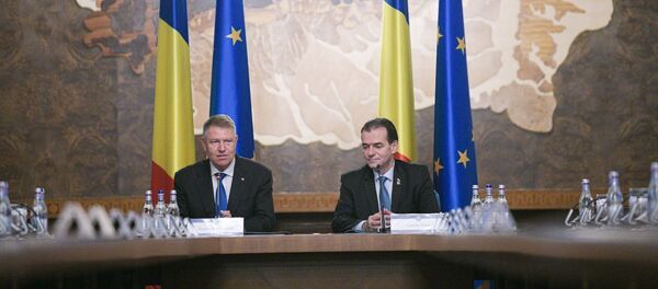 Klaus Iohannis şi Ludovic Orban. Guvernului României Klaus Iohannis şi Ludovic Orban. Guvernului României - Sputnik Moldova-România