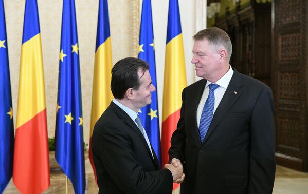 Klaus Iohannis şi Ludovic Orban. Guvernului României - Sputnik Moldova-România