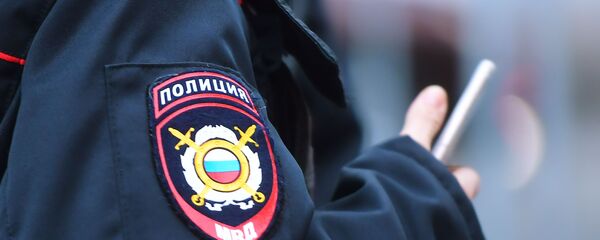 Эмблема на форме сотрудника полиции - Sputnik Молдова