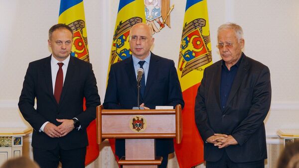 Представители Демпартии во время заявлений для прессы после консультаций с президентом Игорем Додоном - Sputnik Moldova