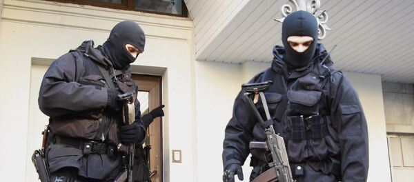 Сотрудники спецподразделения СБУ у здания Нафтогаза - Sputnik Moldova-România